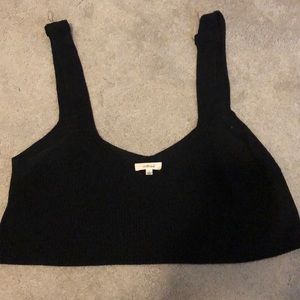 Black crop top from Wilfred. Fits looser.